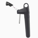 Coravin wine opener with a removable top, featuring a needle for pouring wine without cork damage.